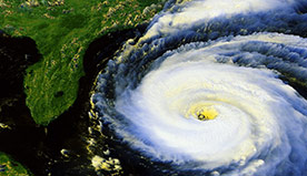 Photo of satellite imagery of a hurricane approaching Florida.